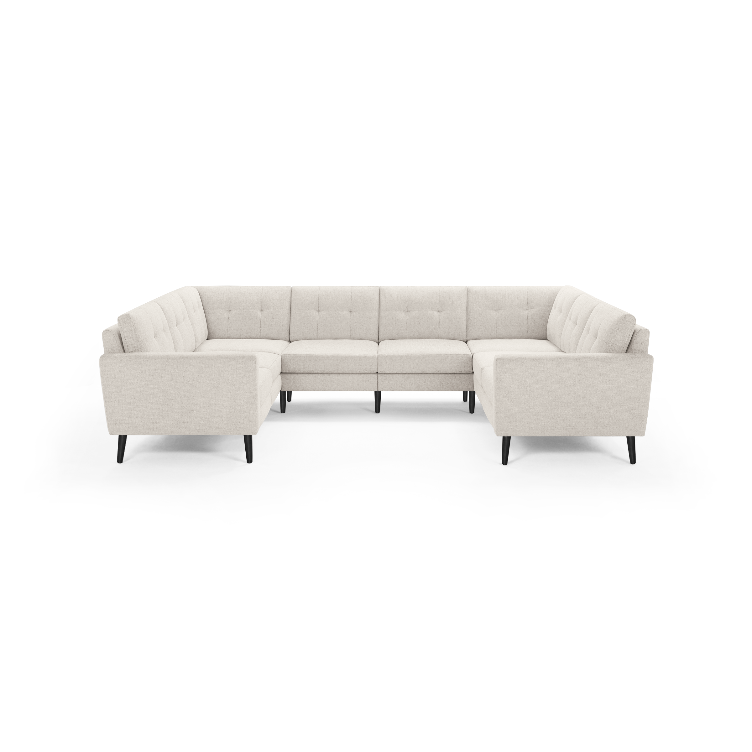 Modern U-shaped sectional sofa in light beige fabric with tufted cushions and black tapered legs, spacious for seating multiple people.