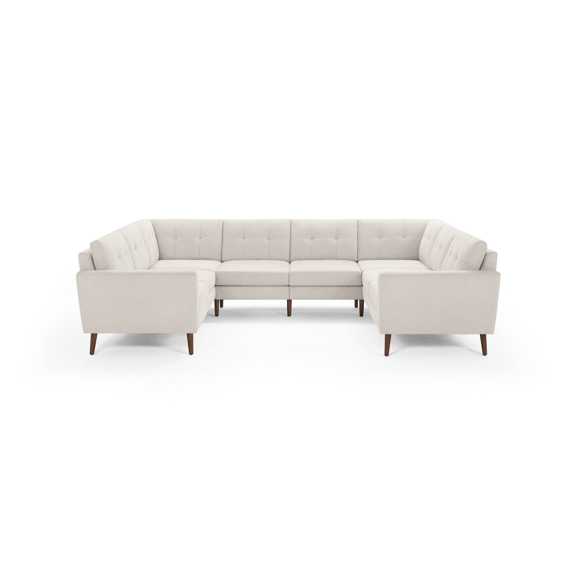 Beige upholstered L-shaped sectional sofa with tufted back cushions and wooden legs on a black background.