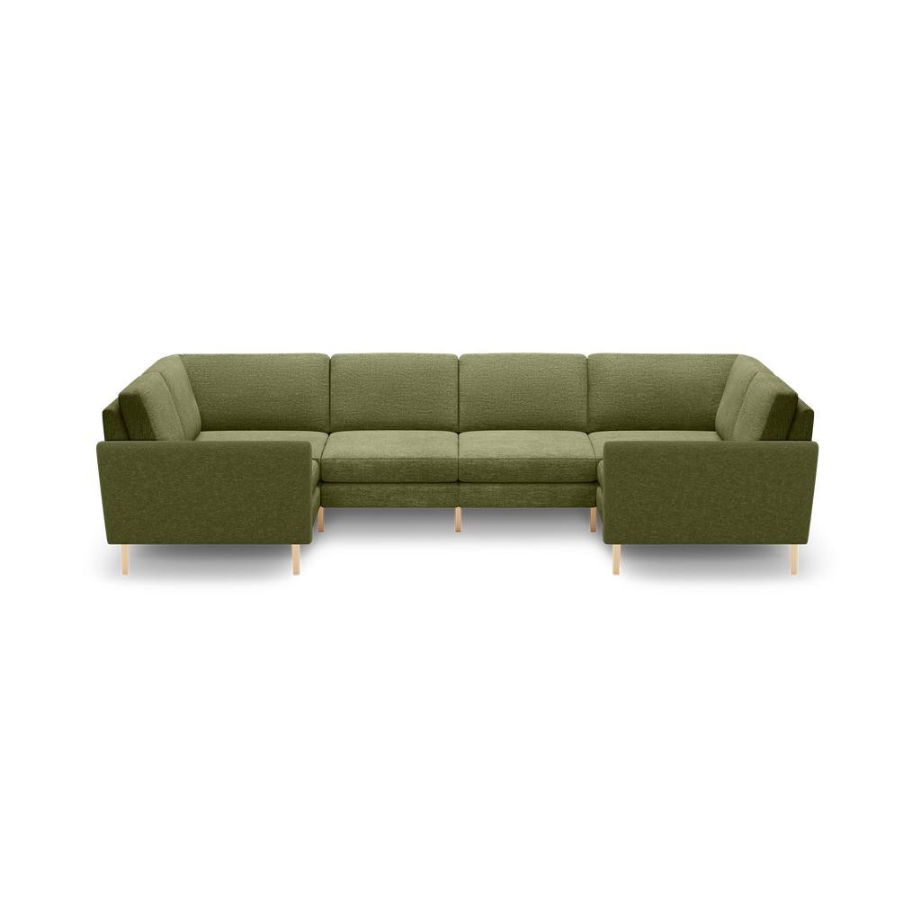 Olive green fabric sectional sofa with clean lines, square arms, and light wooden legs on black background.