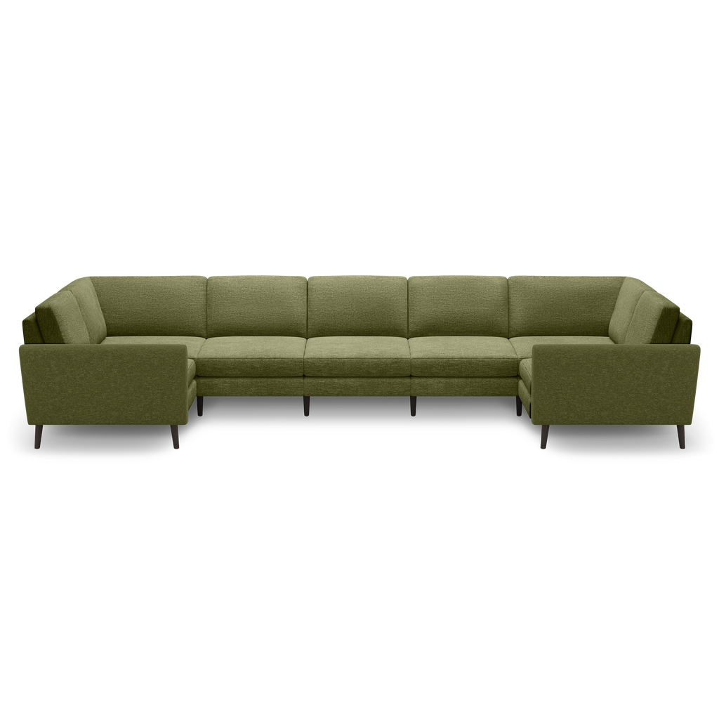 Large olive green fabric U-shaped sectional sofa with clean lines, cushioned seats, and dark wooden legs.