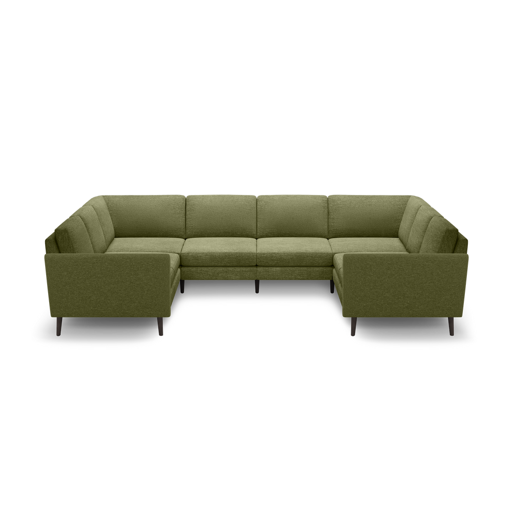 Modern U-shaped sectional sofa in olive green fabric with tufted back cushions and dark wooden legs on black background.