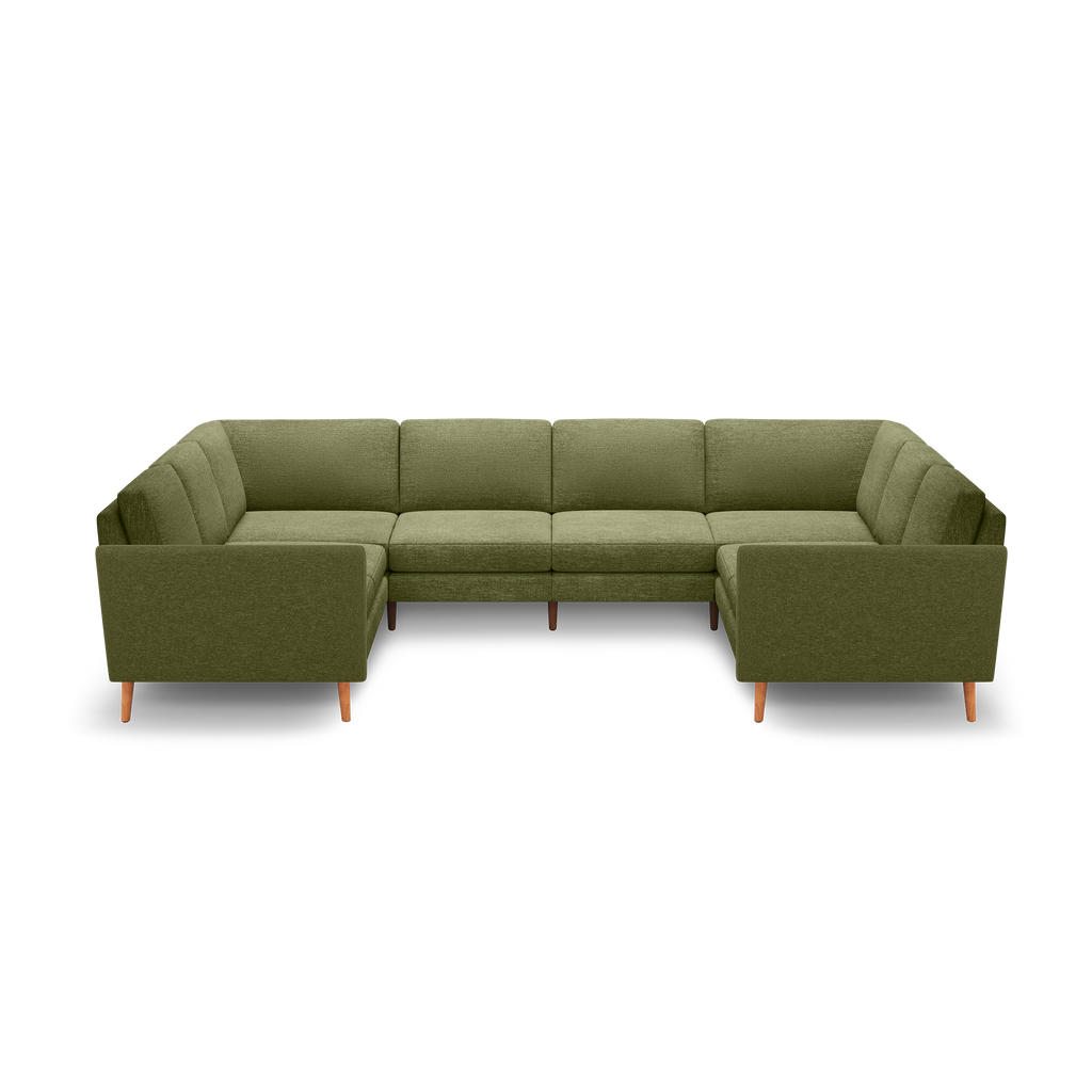 Modern U-shaped sectional sofa in olive green fabric with wooden legs, tufted cushions, and clean, straight-lined armrests.