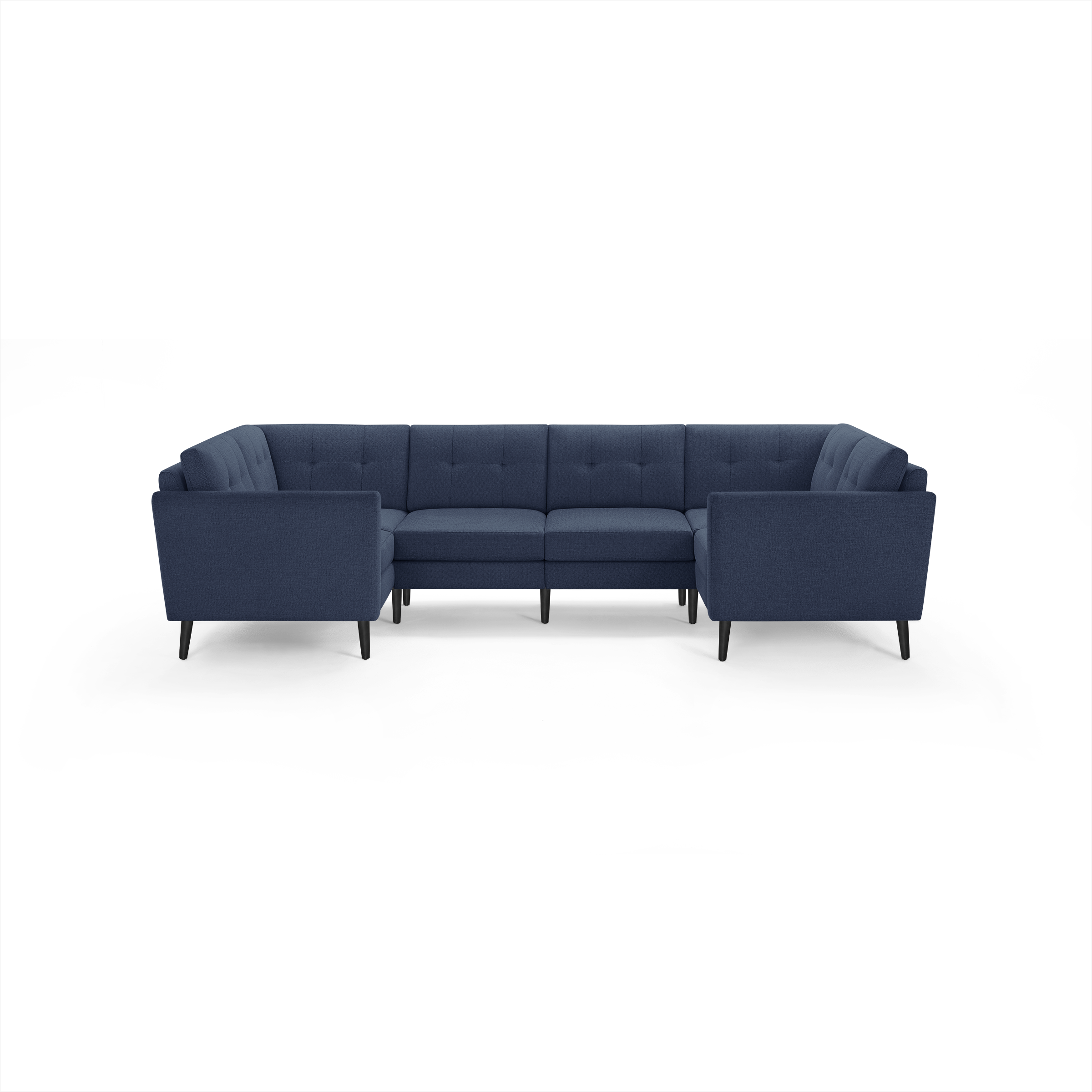 Modern U-shaped sectional sofa in navy blue fabric with tufted back cushions and black tapered legs.
