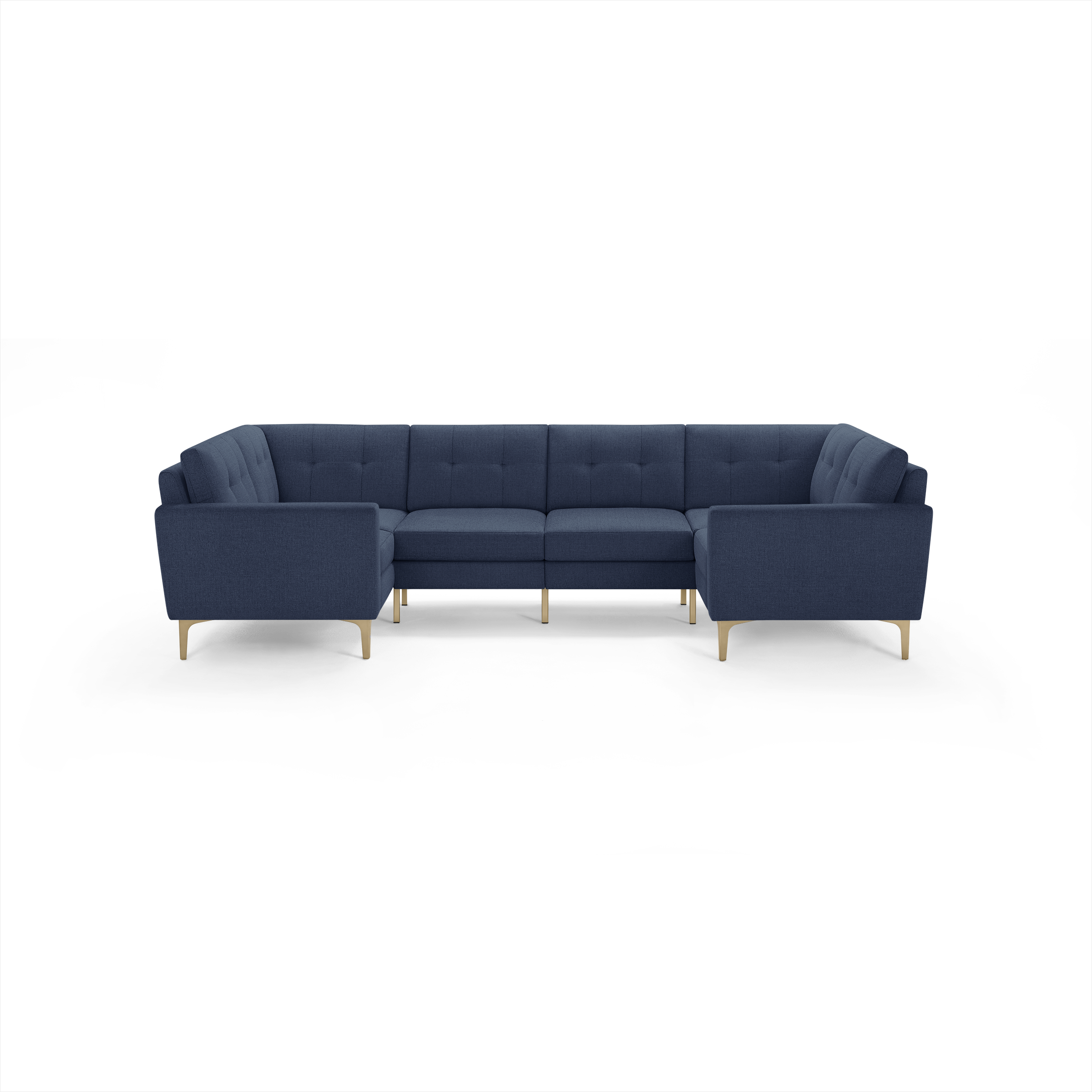 Large navy blue L-shaped sectional sofa with tufted back cushions and light wooden legs, modern and minimalist design.