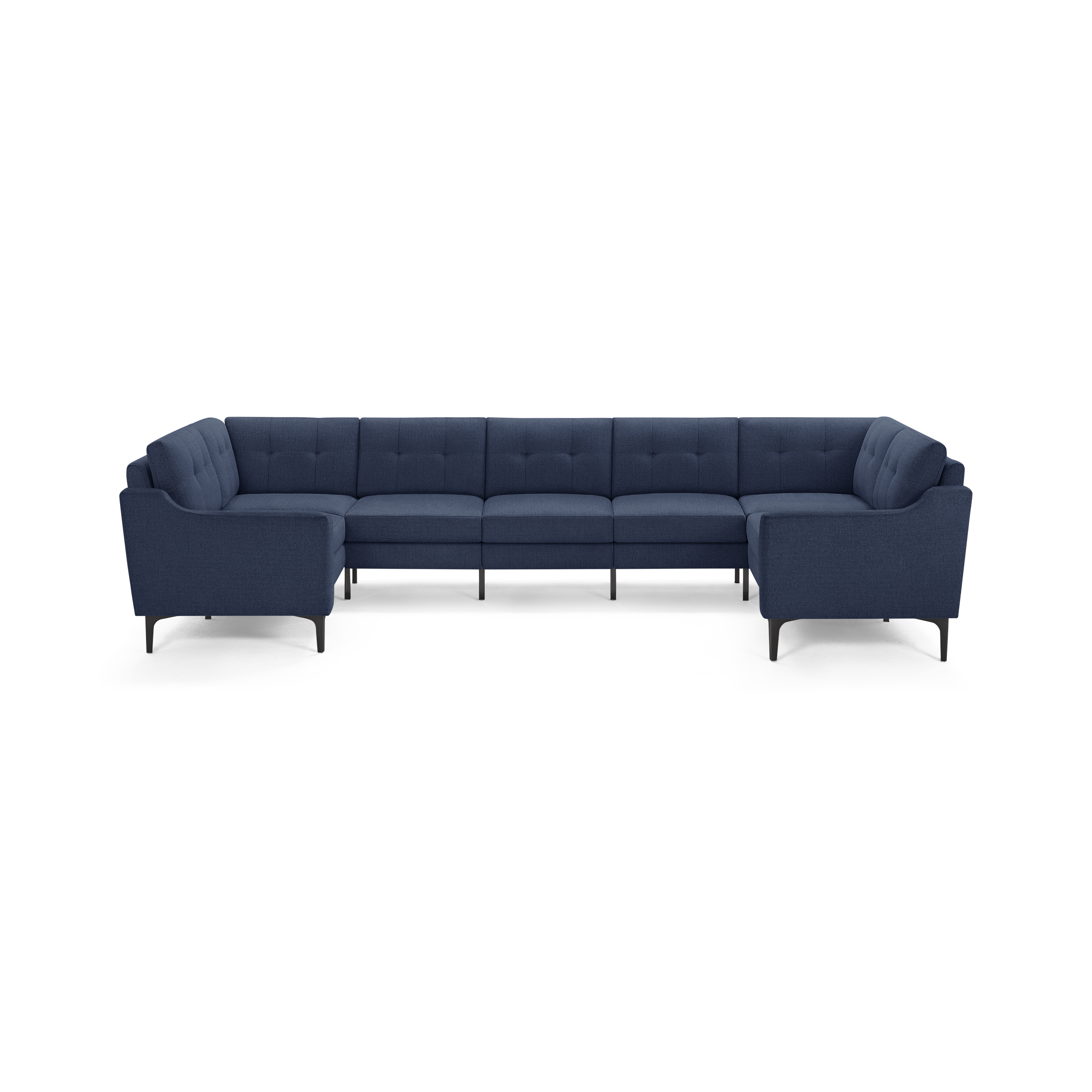 Large U-shaped sectional sofa in dark blue fabric with tufted back cushions and slim black metal legs.