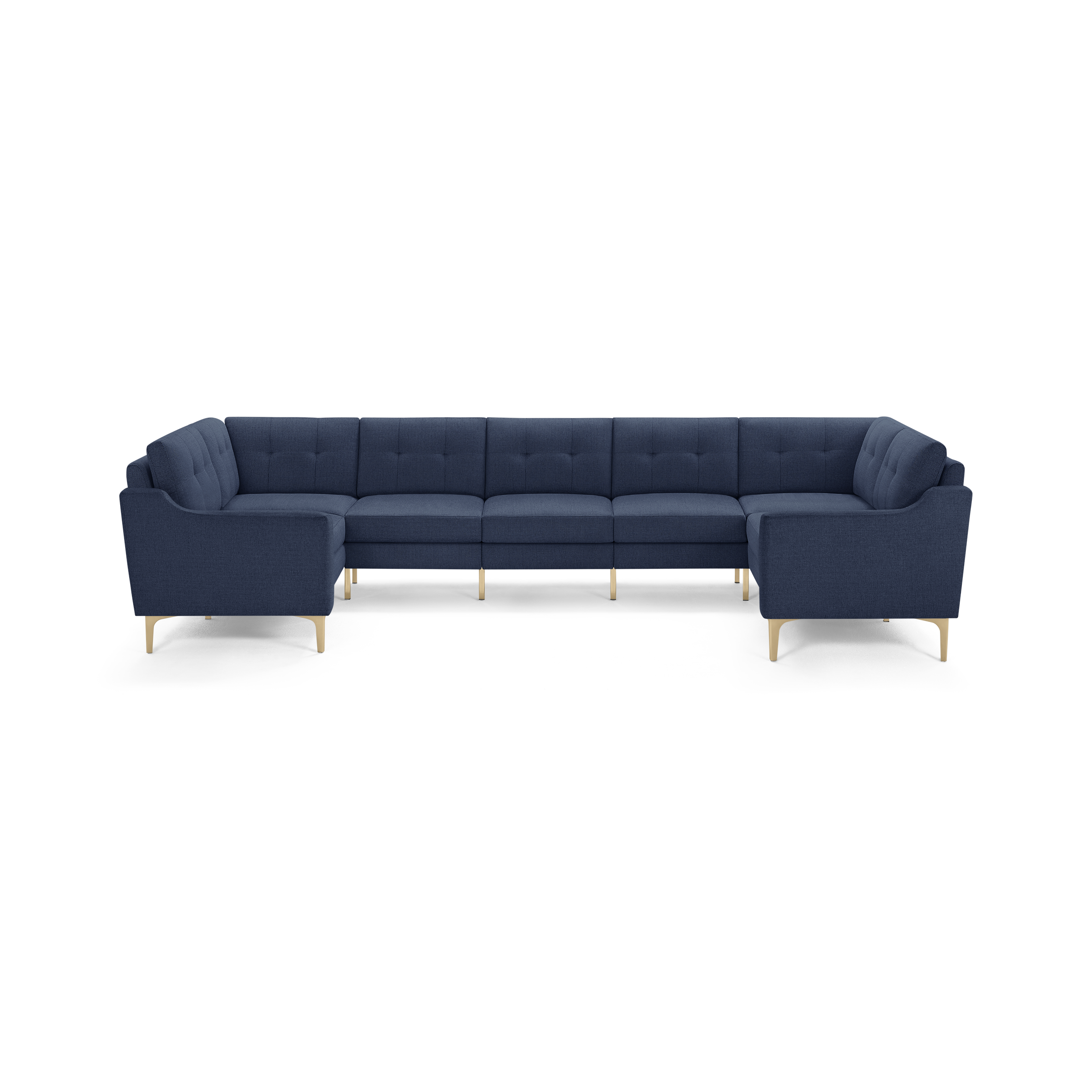 Large modern U-shaped sectional sofa in dark blue fabric with tufted cushions and light wooden legs.