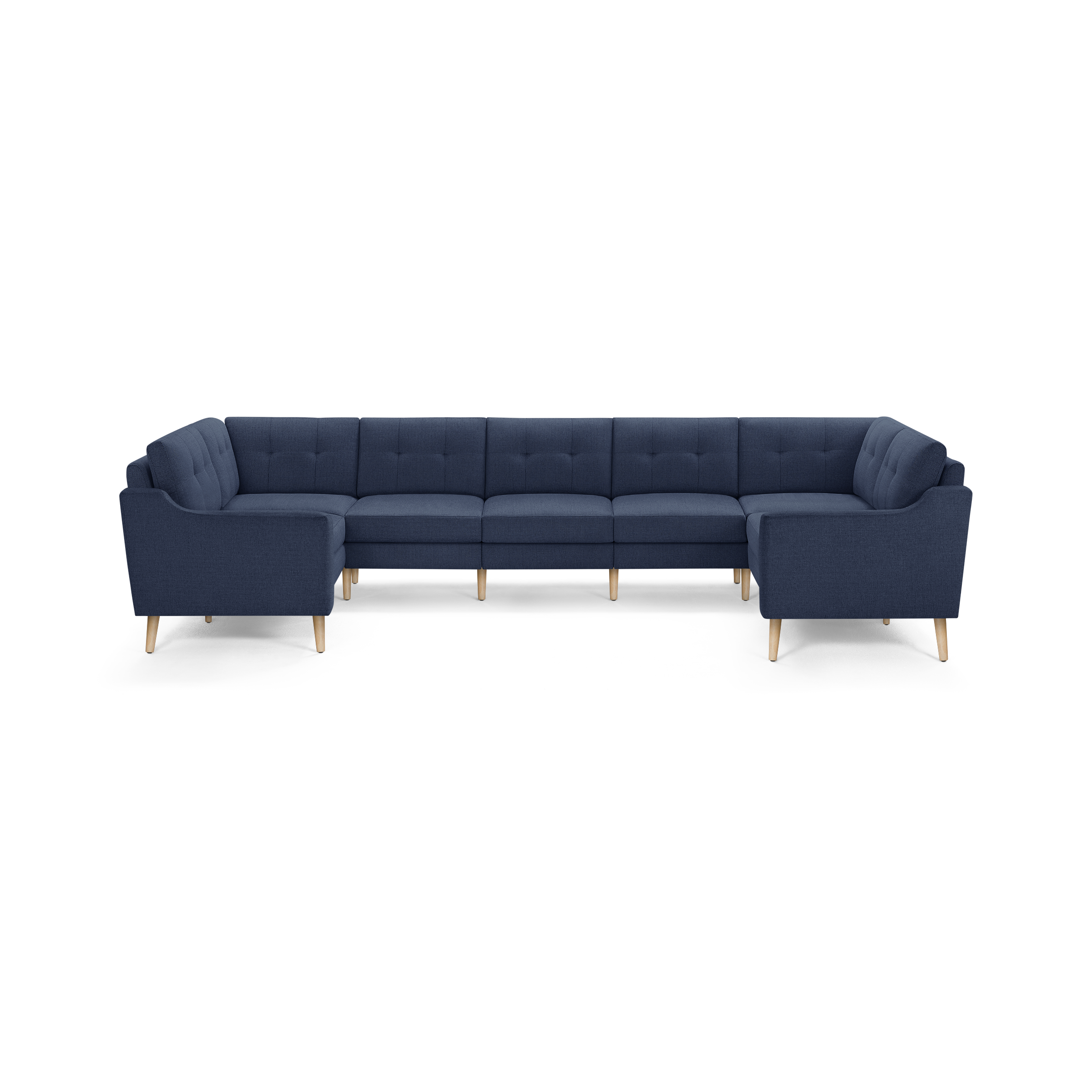 Large U-shaped sectional sofa in dark blue fabric with tufted back cushions and light wooden legs, designed for spacious seating.