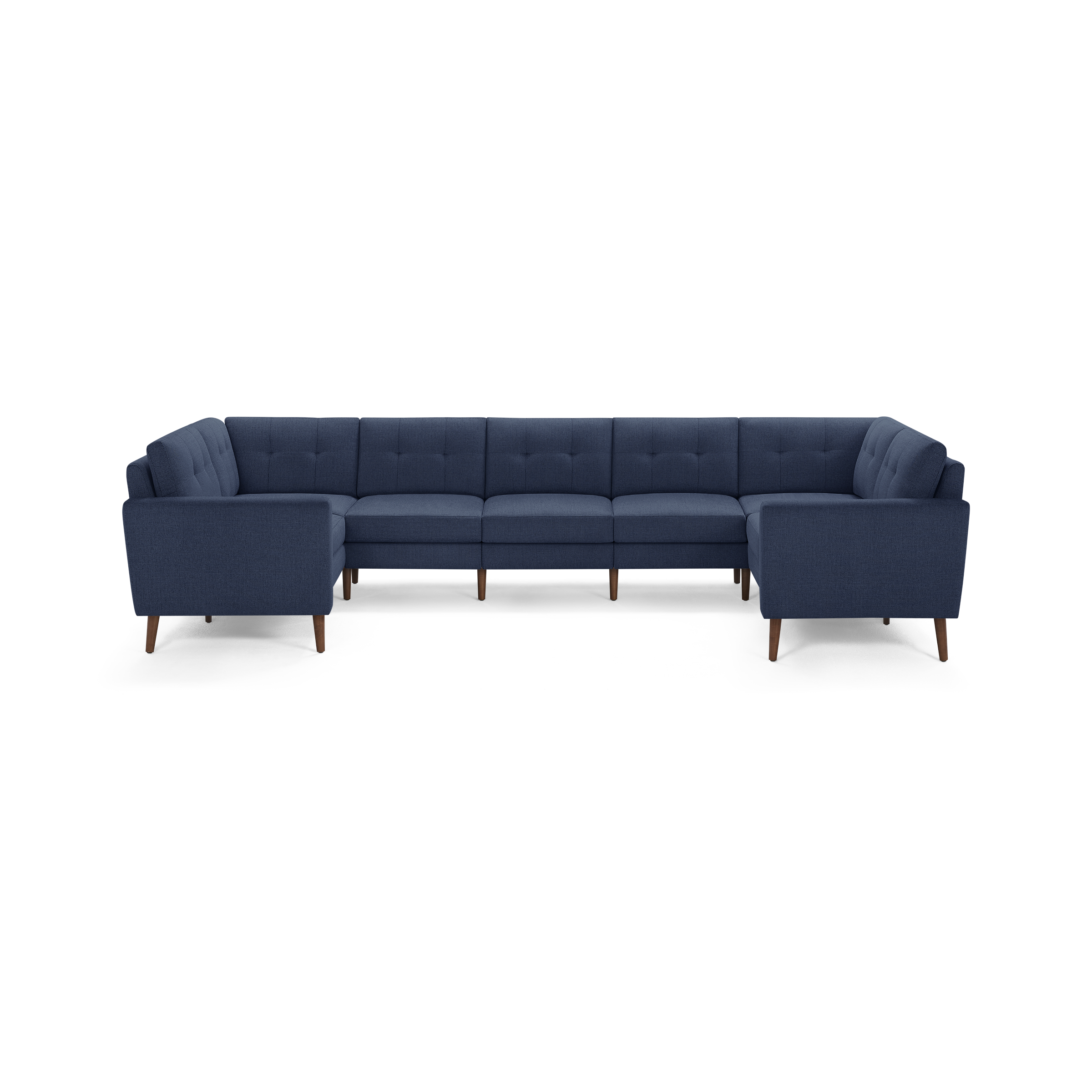 Large navy blue fabric sectional sofa with tufted back cushions and angled wooden legs on a white background.