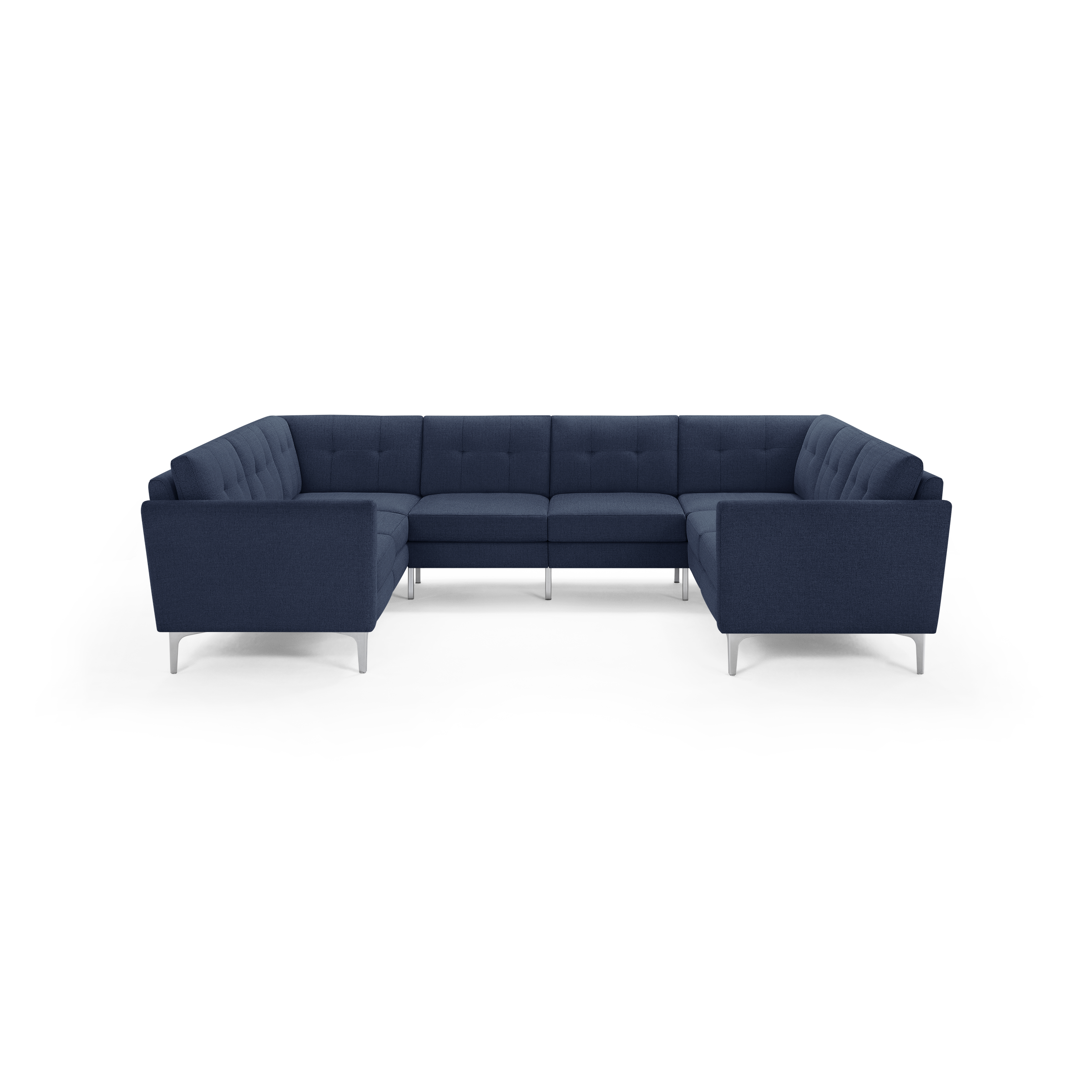 Modern U-shaped sectional sofa with navy blue fabric upholstery, tufted back cushions, and silver metal legs.