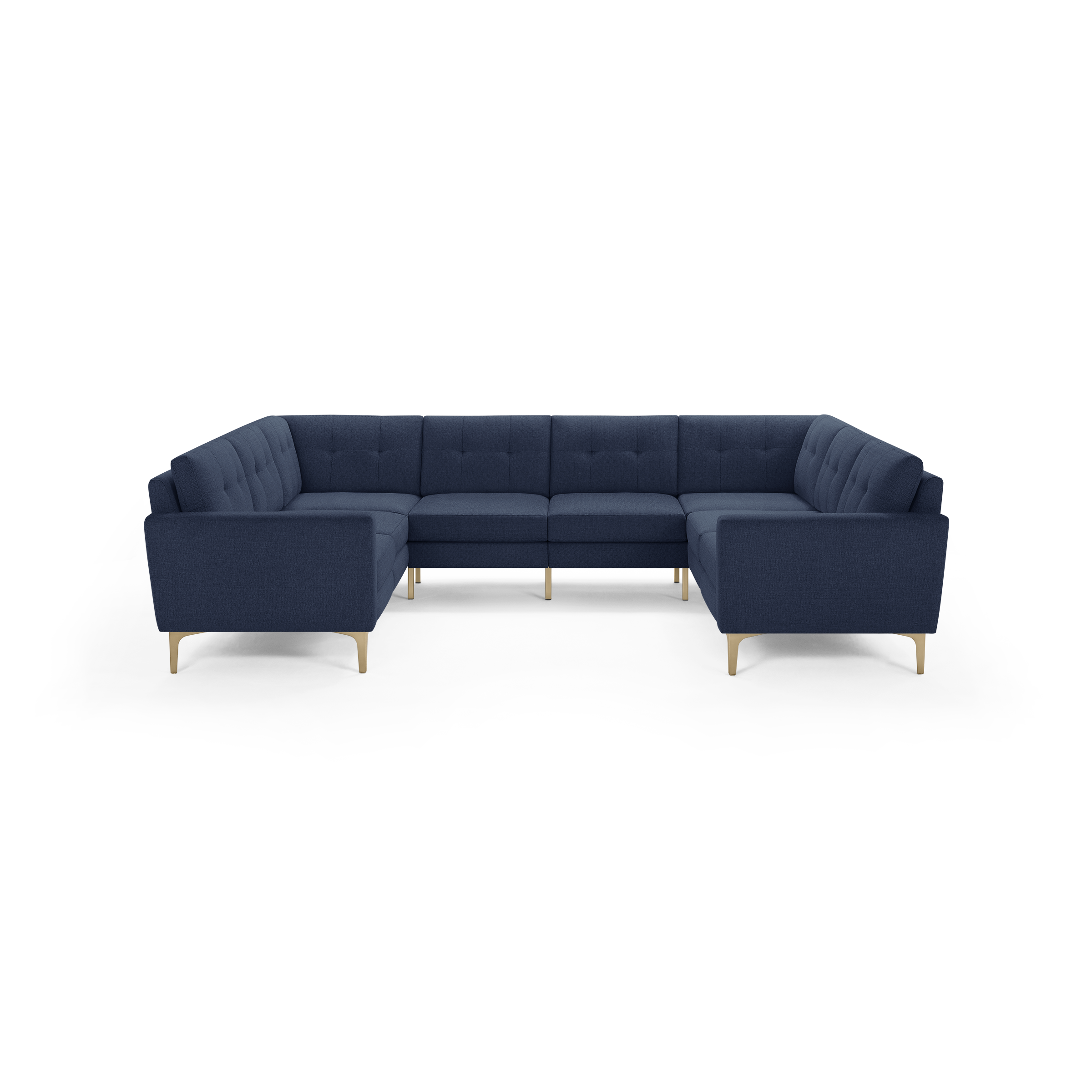 Large U-shaped sectional sofa with deep blue fabric upholstery, tufted cushions, and light wooden legs.