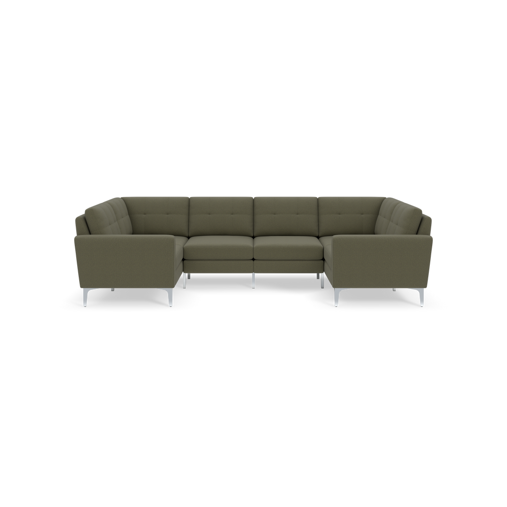 Modern olive-green L-shaped sectional sofa with tufted cushions and silver metal legs, viewed frontally against black background.