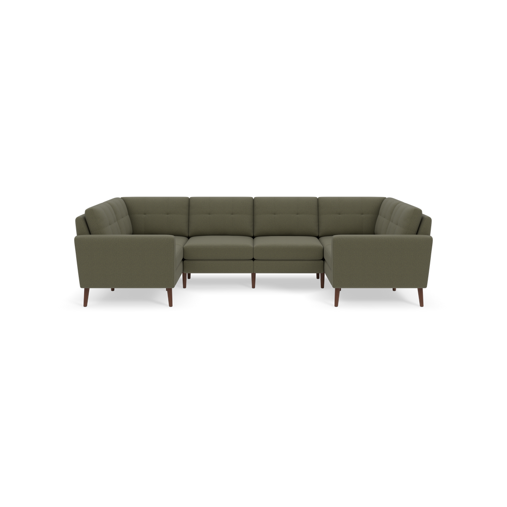 Modern Moss green sectional sofa with tufted cushions, wooden legs, and a spacious L-shaped design, isolated on black background.