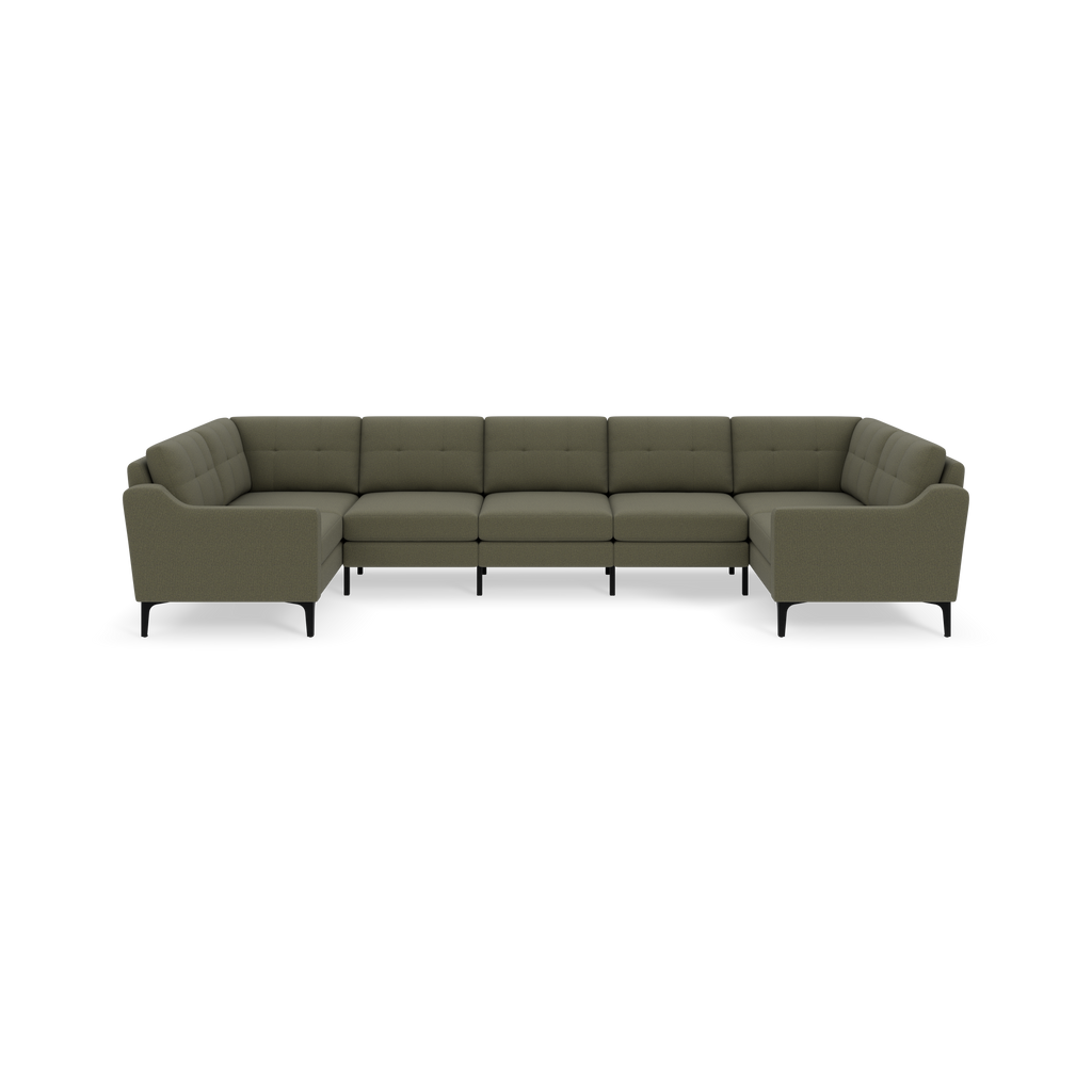 Large sectional sofa in Moss green fabric with tufted cushions and black metal legs, designed for spacious living rooms.