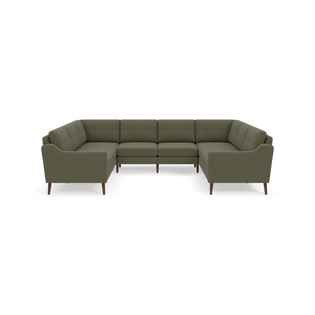 L-shaped sectional sofa upholstered in Moss green fabric with tufted back cushions and wooden tapered legs, shown on a black background.
