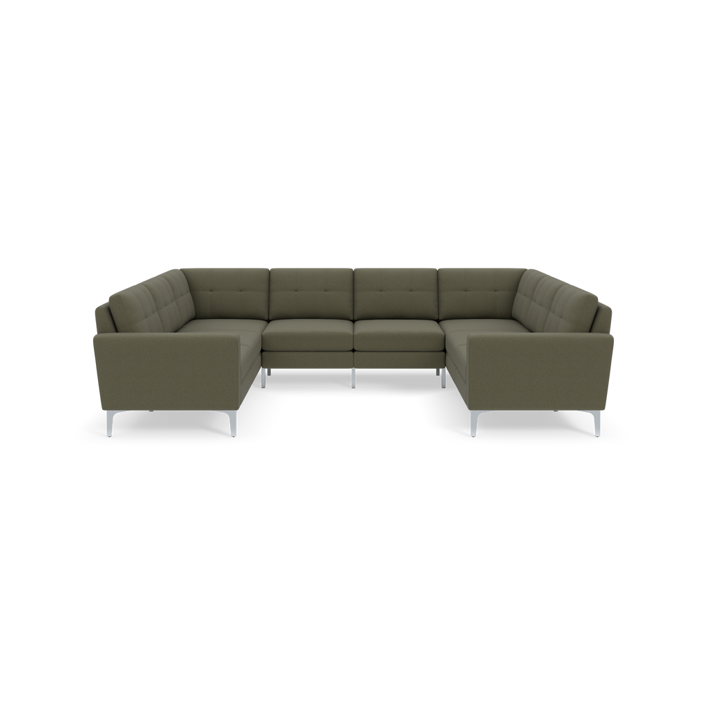 U-shaped sectional sofa with Moss green upholstery, tufted cushions, and sleek silver metal legs against black background.