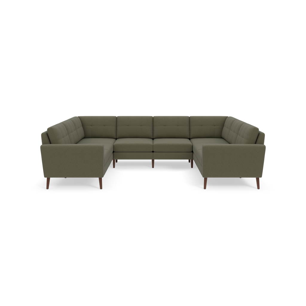 U-shaped sectional sofa with Moss green fabric upholstery, tufted back cushions, and wooden tapered legs.