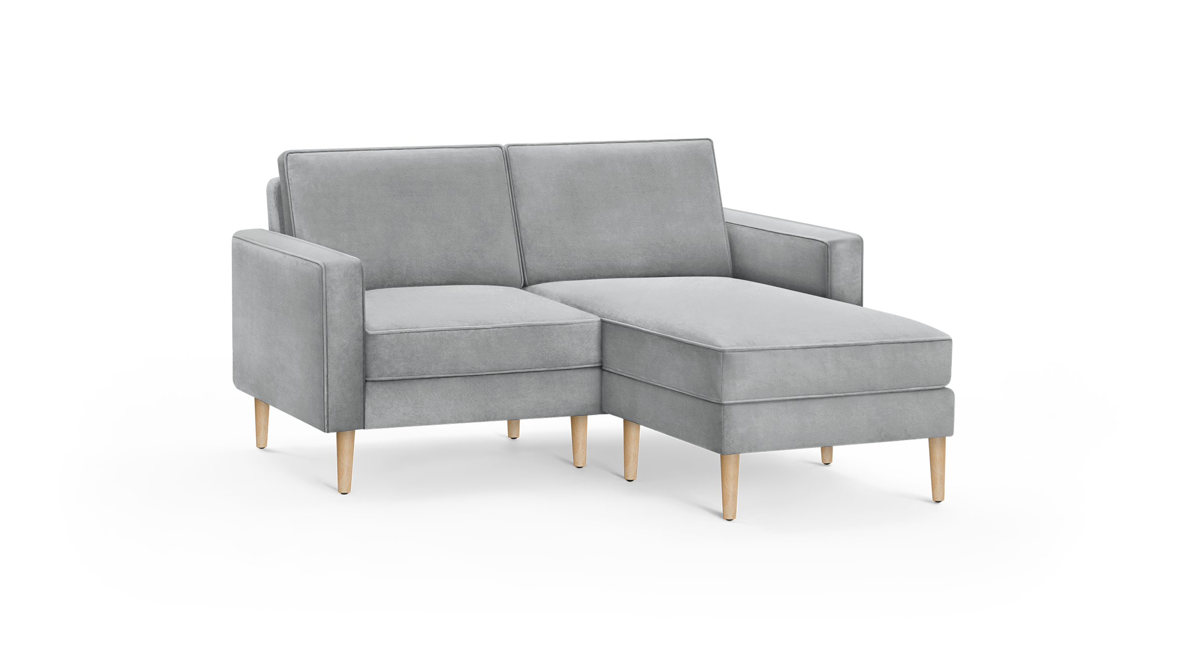 light gray modern sectional sofa with wooden legs and matching chaise lounge, featuring a clean, minimalist design