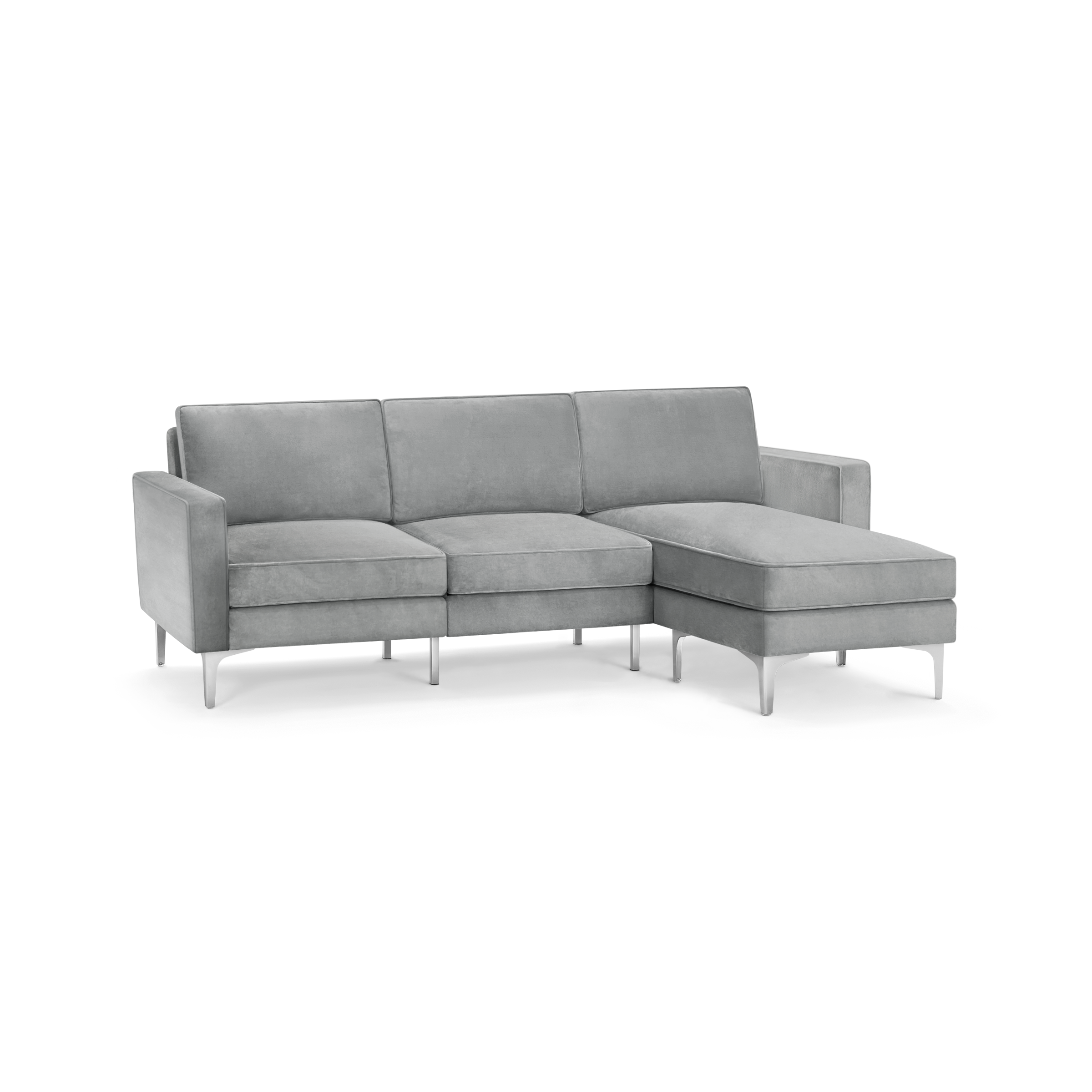 modern l - shaped sectional sofa with light gray fabric upholstery, tapered armrests, and tapered backrests, featuring
