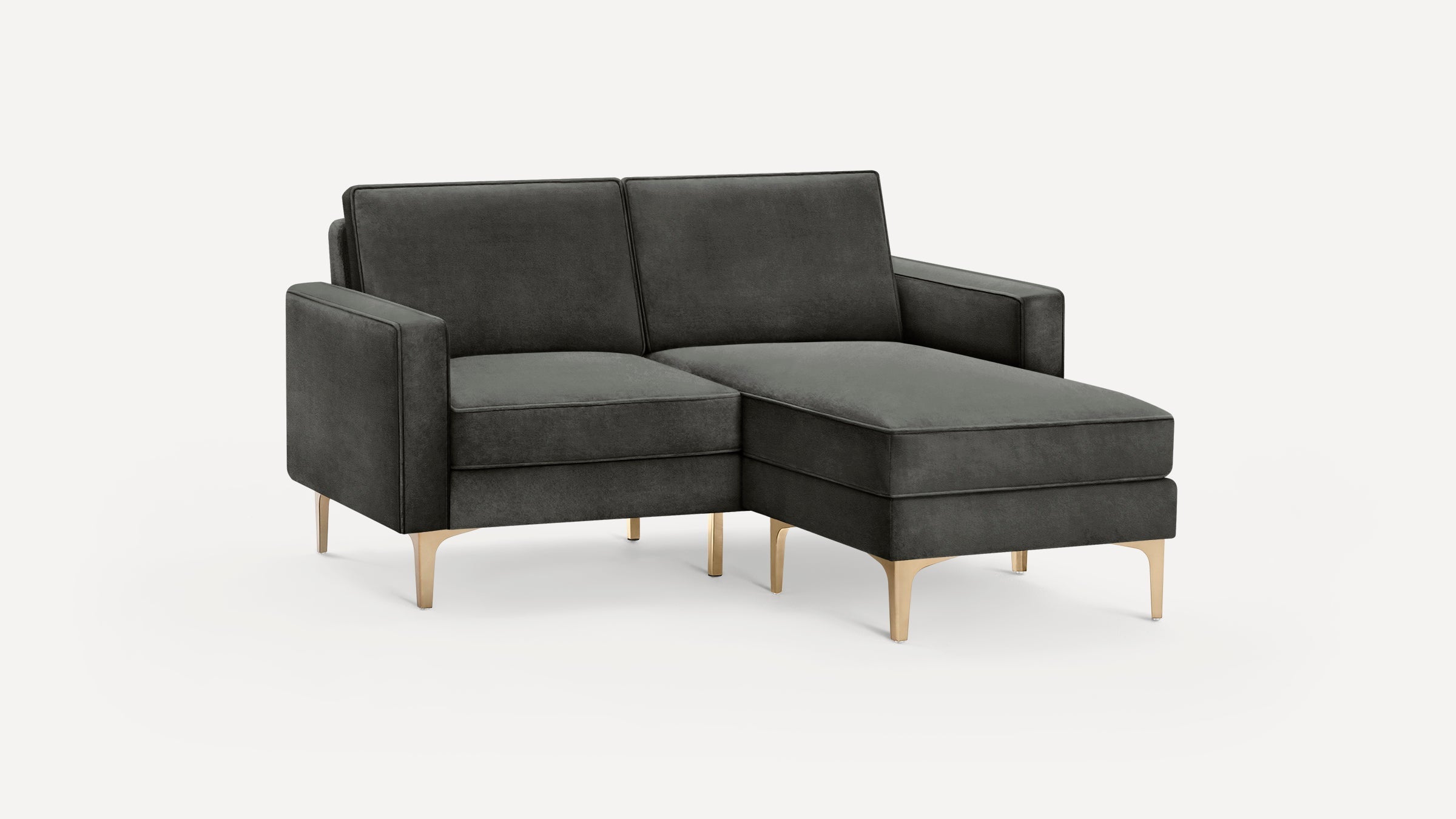 Modern dark gray fabric chaise lounge sofa with gold metal legs, featuring a right-side extended seating area and clean, straight armrests.