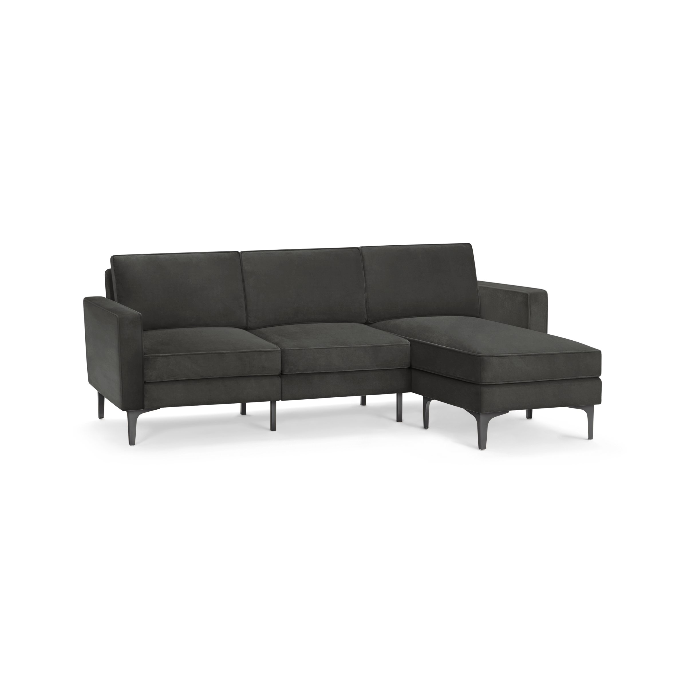 modern dark gray sectional sofa with tufted back cushions and black tapered legs, featuring a clean, minimalist design