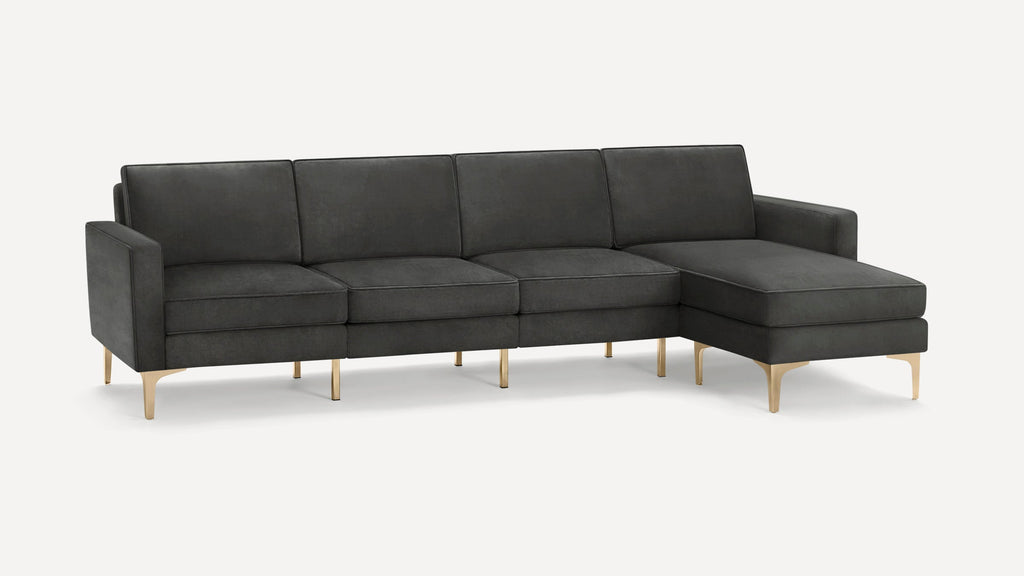 Modern dark gray sectional sofa with gold metal legs, featuring a right-side chaise lounge and clean lines.