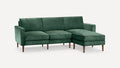 Dark green velvet L-shaped sectional sofa with wooden tapered legs and cushioned seats and backrests.