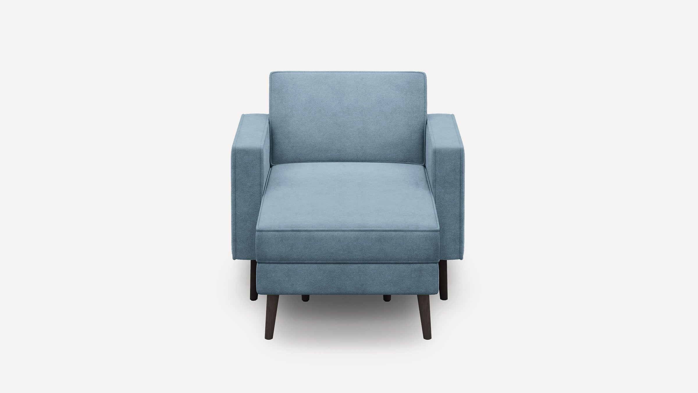 Modern light blue upholstered armchair with dark wooden legs, square arms, and cushioned seat and backrest, shown from the front.
