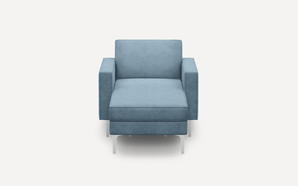 Blue upholstered modern armchair with wide armrests and slim metal legs on a plain white background.