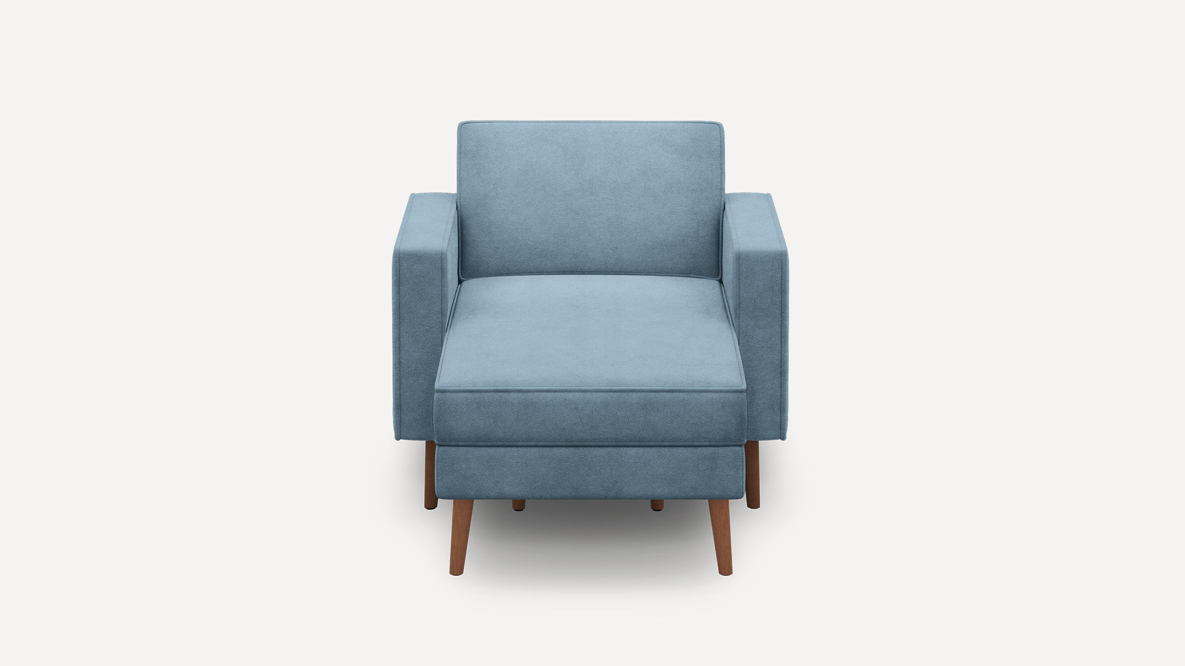 Front view of a modern, blue upholstered armchair with wooden legs and clean, simple lines.