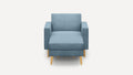 modern light blue upholstered armchair with wooden legs and a soft cushioned seat, isolated against a white background