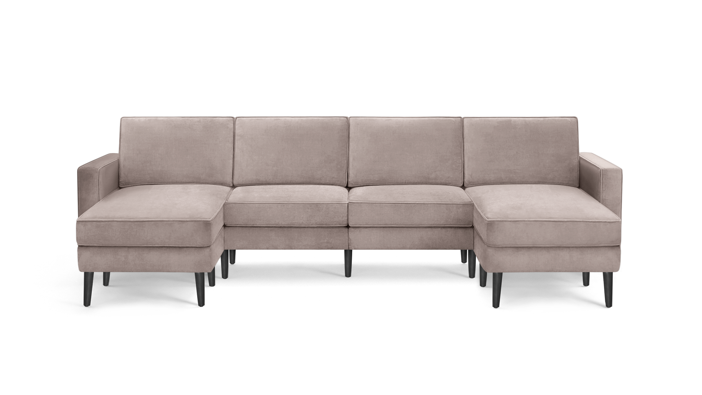 modern light pink velvet sectional sofa with black metal legs and clean lines on the back, featuring a chaise lounge and matching ottoman