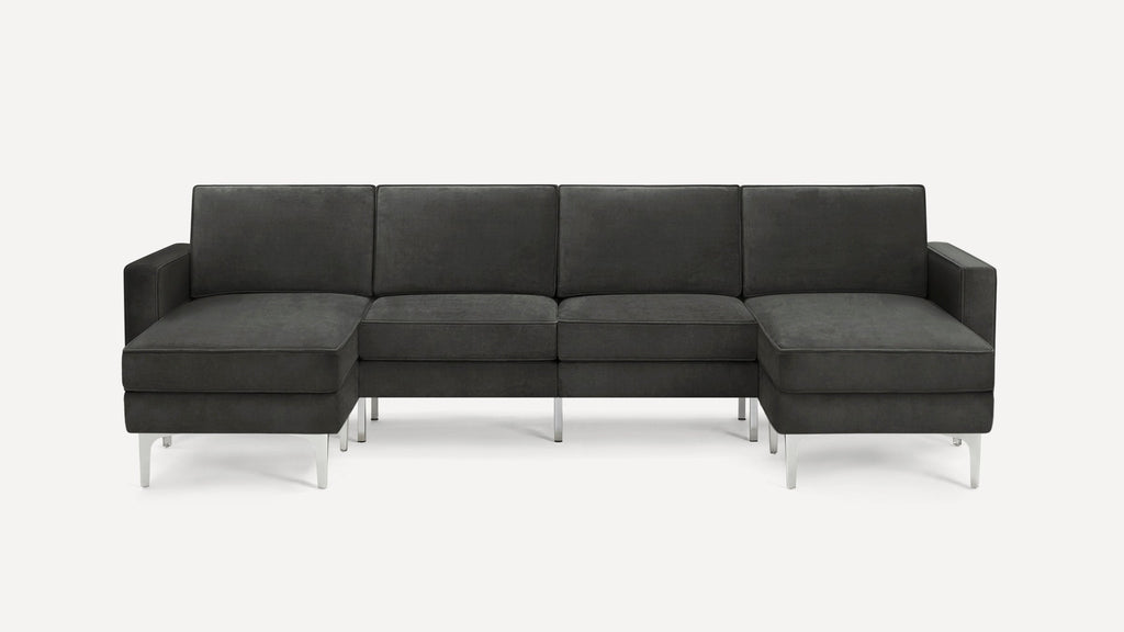 Modern charcoal gray sectional sofa with slim metal legs, featuring left and right chaise ends and clean, minimal design.