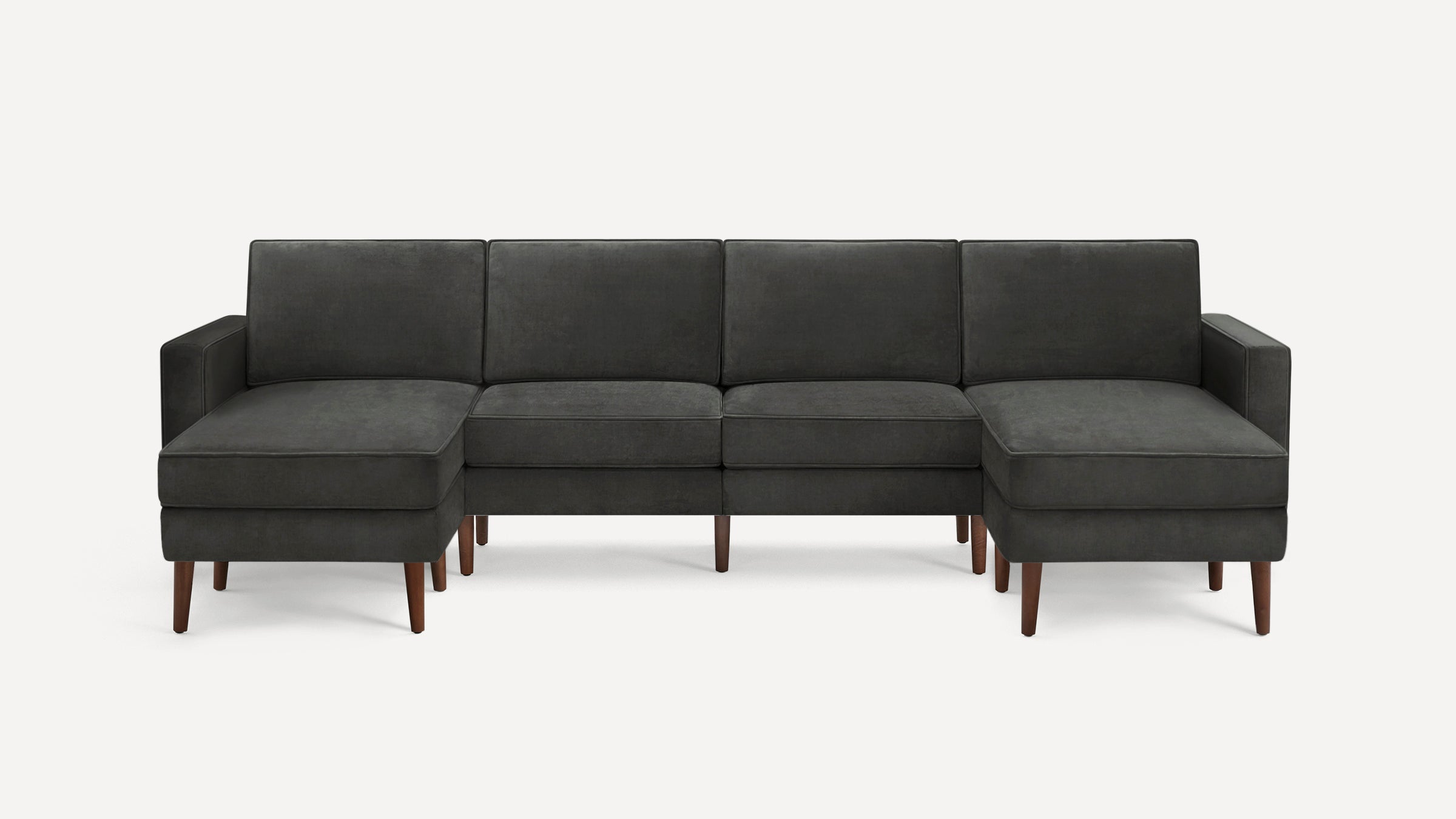 Dark gray modern sectional sofa with left and right chaise lounges, wooden tapered legs, and clean-lined cushions.