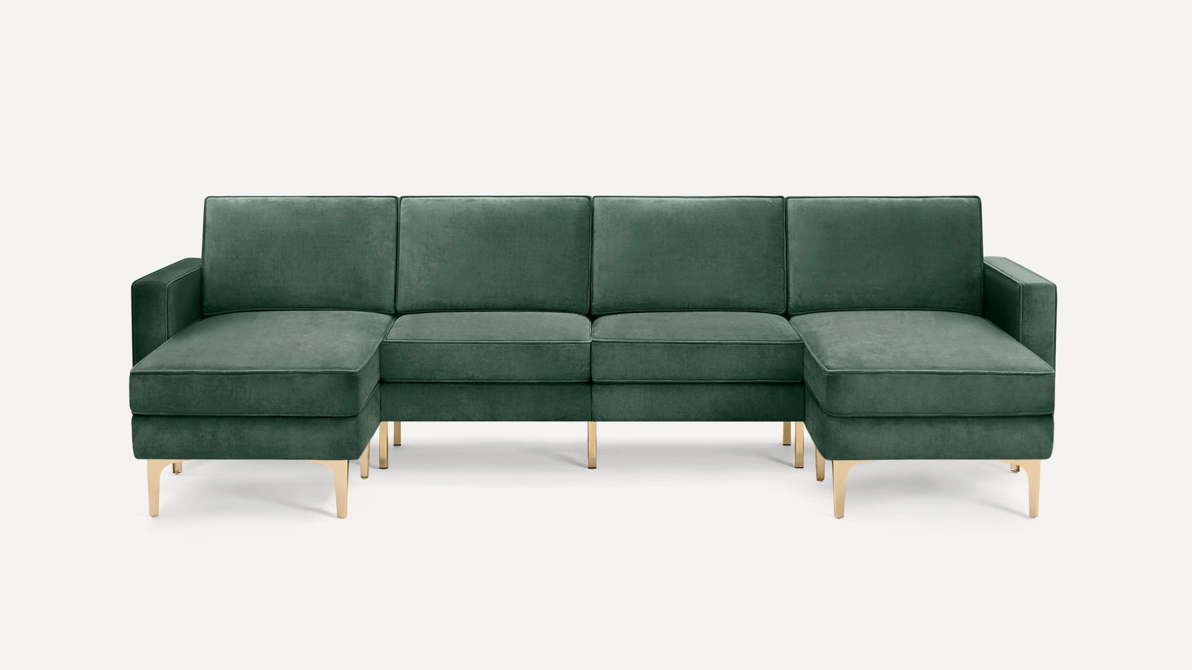 Green velvet sectional sofa with gold metal legs, featuring left and right chaise ends, against a plain white background.