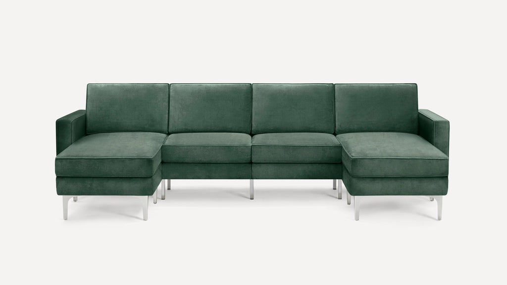 Modern green velvet sectional sofa with metal legs, featuring two chaise lounges on either side and straight armrests.