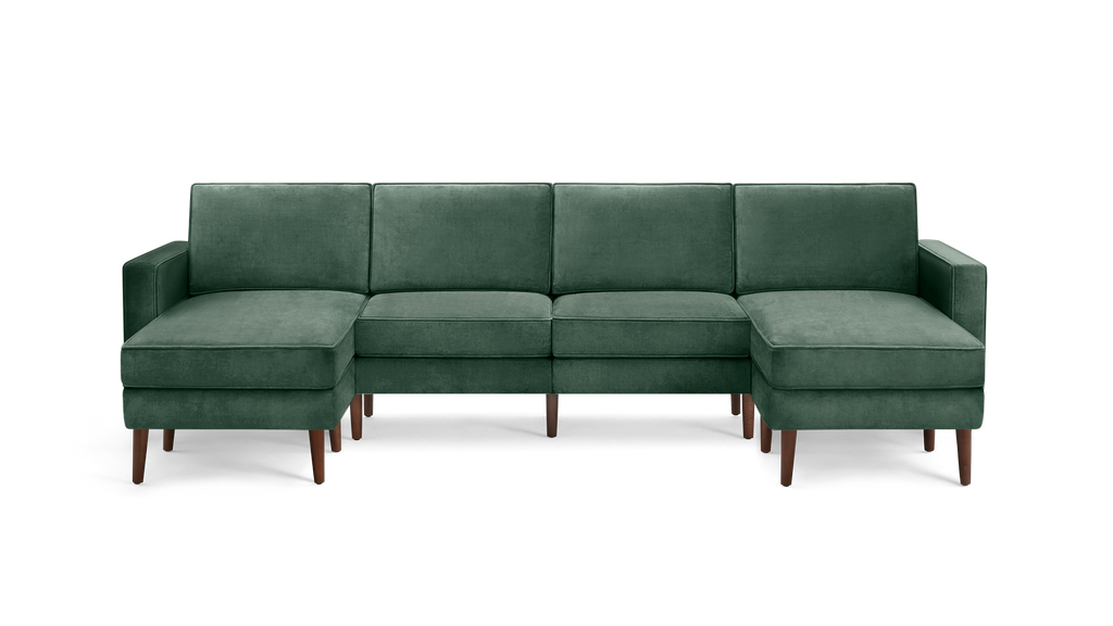 modern green velvet sectional sofa with wooden legs and clean lines on the back, featuring a clean, modern design