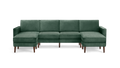 modern green velvet sectional sofa with wooden legs and clean lines on the back, featuring a clean, modern design