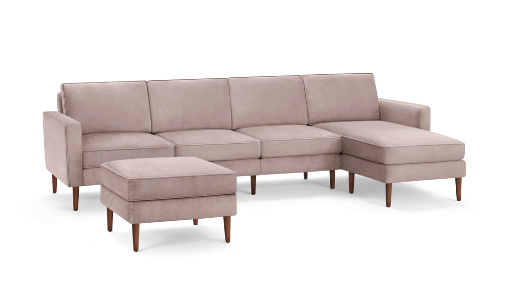 modern light pink sectional sofa with matching ottoman and matching ottoman, featuring wooden legs and clean lines on the back