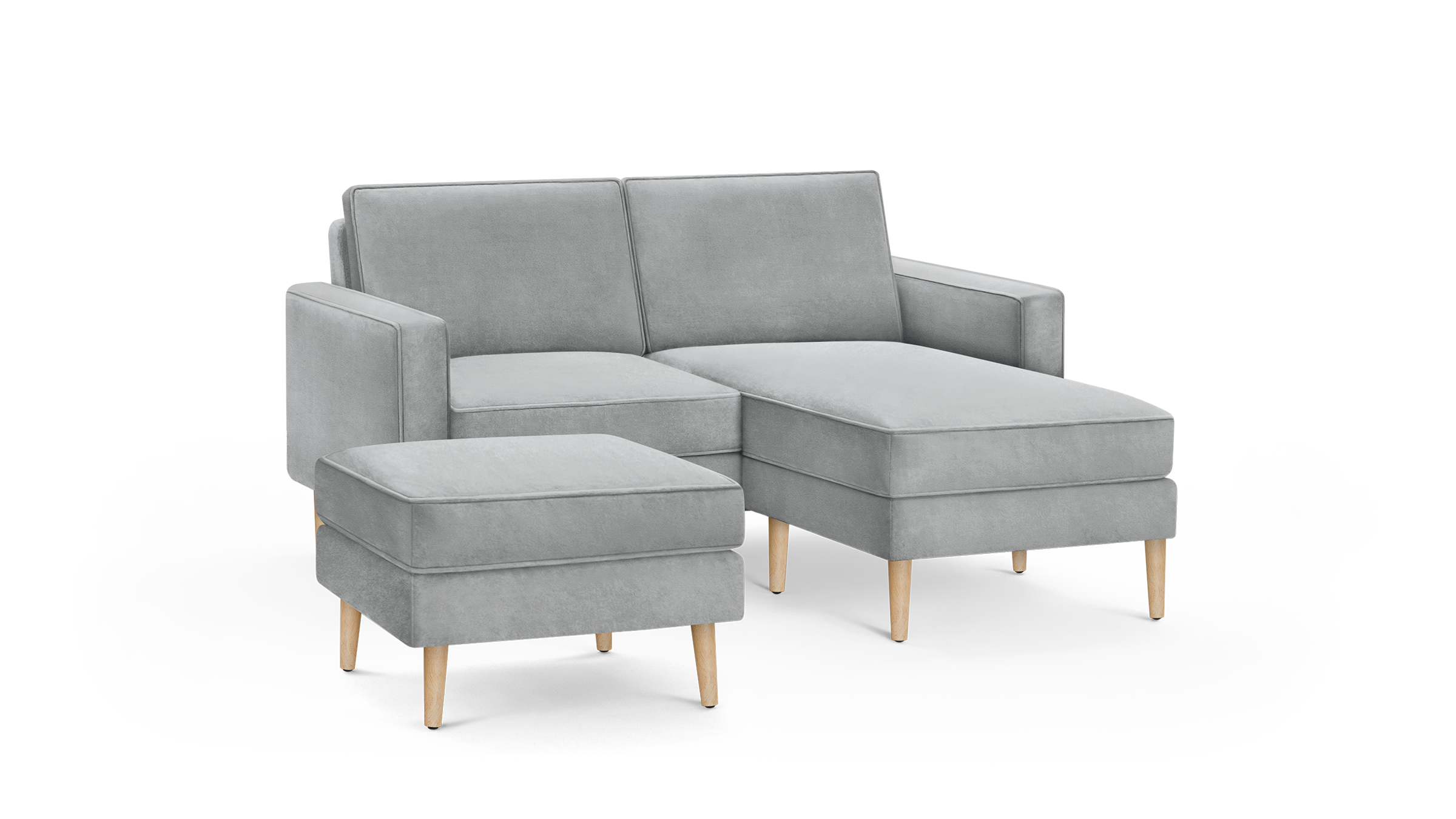 light gray modern sectional sofa with matching ottoman and wooden legs, featuring a clean, minimalist design
