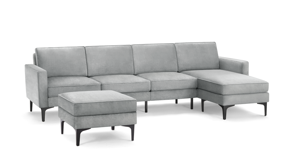 modern light gray fabric sectional sofa with matching ottoman, featuring sleek metal legs and a sleek design