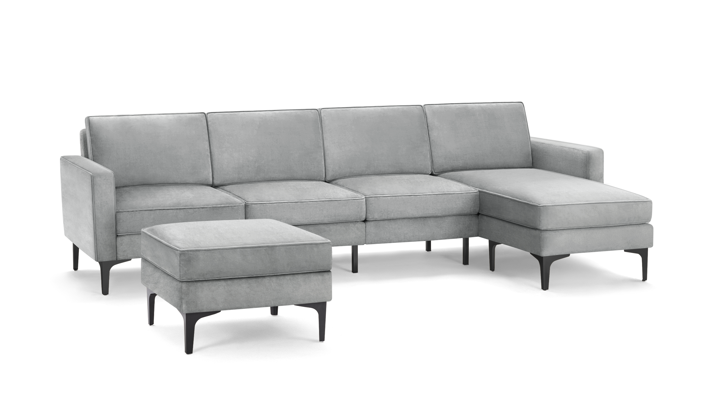 modern light gray fabric sectional sofa with matching ottoman, featuring sleek metal legs and a sleek design