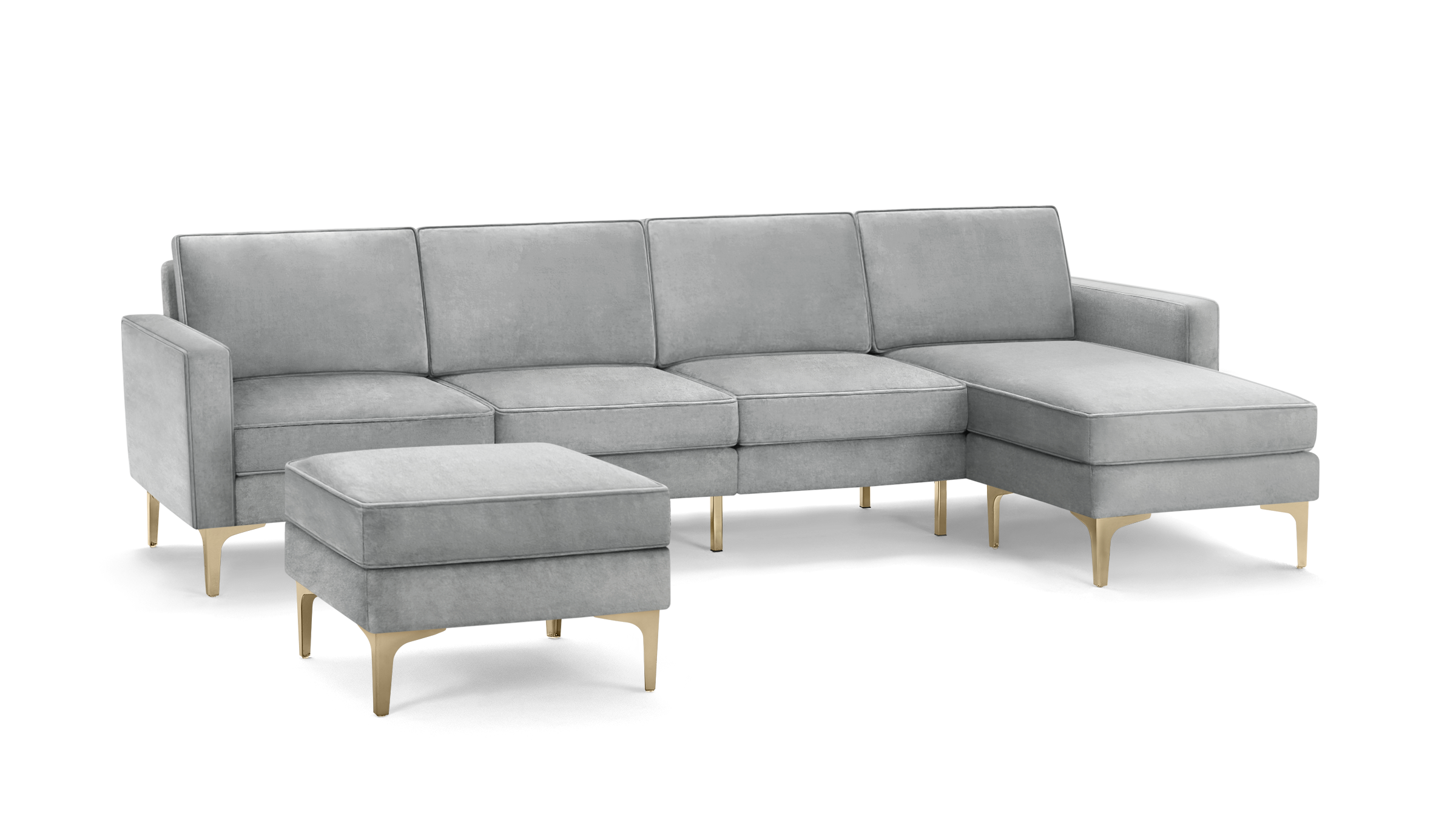 modern light gray velvet sectional sofa with matching ottoman, featuring tapered wooden legs, and matching cushioned seats