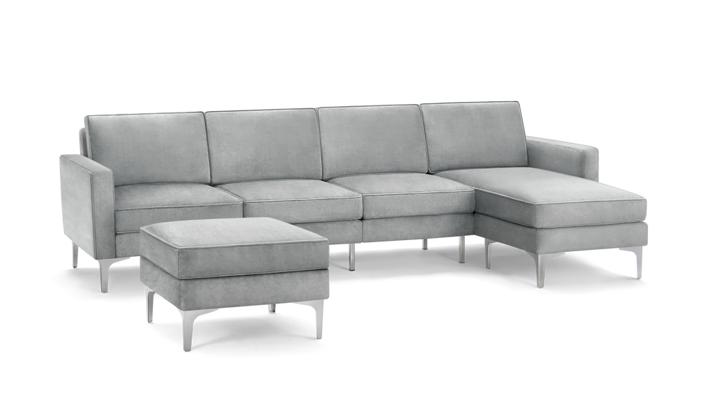 modern light gray fabric sectional sofa with matching ottoman, featuring sleek metal legs and a sleek design