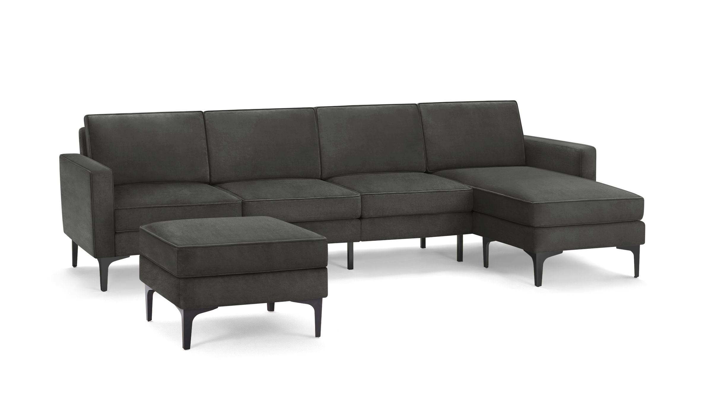modern dark gray fabric sectional sofa with matching ottoman, featuring sleek metal legs and sleek design on the right side