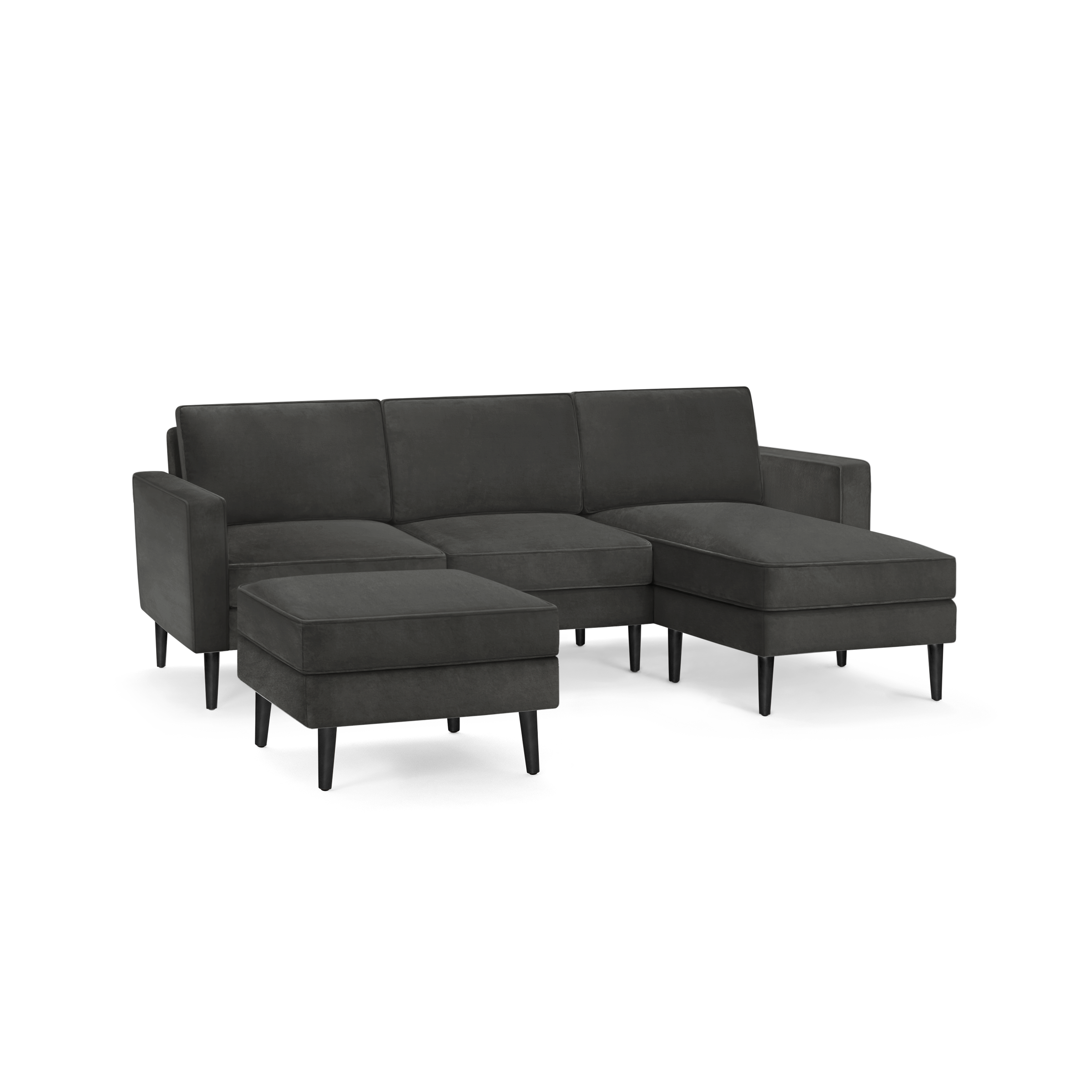 modern dark gray sectional sofa with chaise lounge and matching ottoman, featuring sleek black metal legs and sleek clean lines