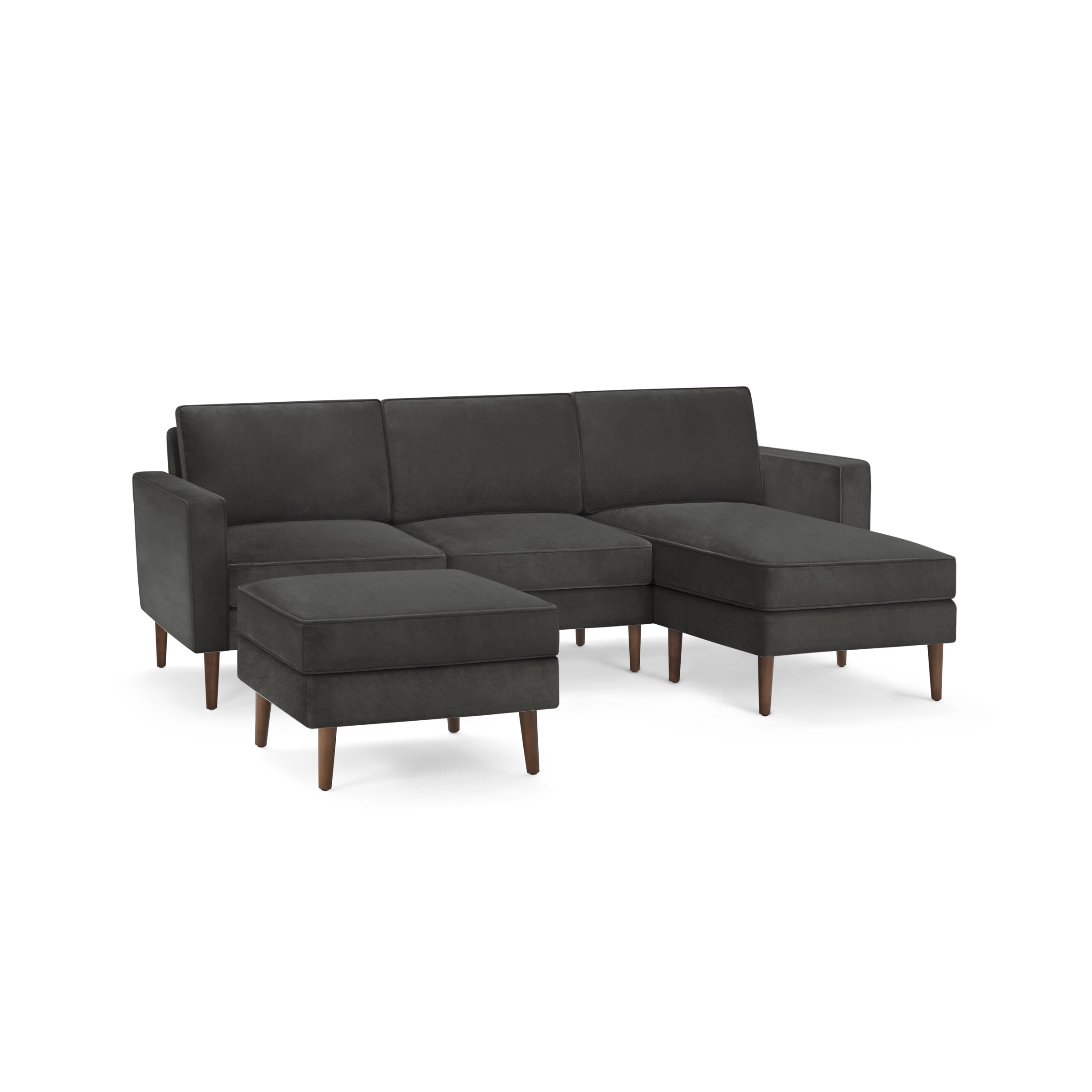 modern dark gray sectional sofa with wooden legs and matching ottoman, featuring a clean, minimalist design