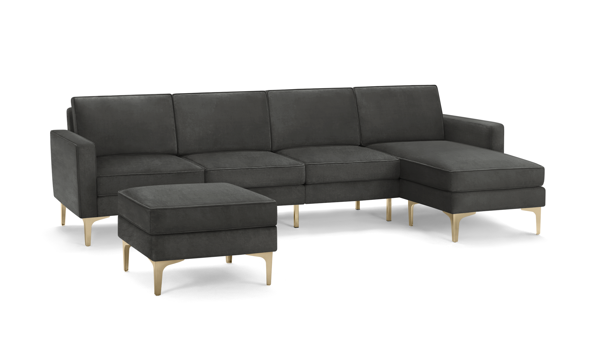 modern dark gray velvet sectional sofa with matching ottoman, featuring tapered wooden legs and matching cushioned cushions, on a black background