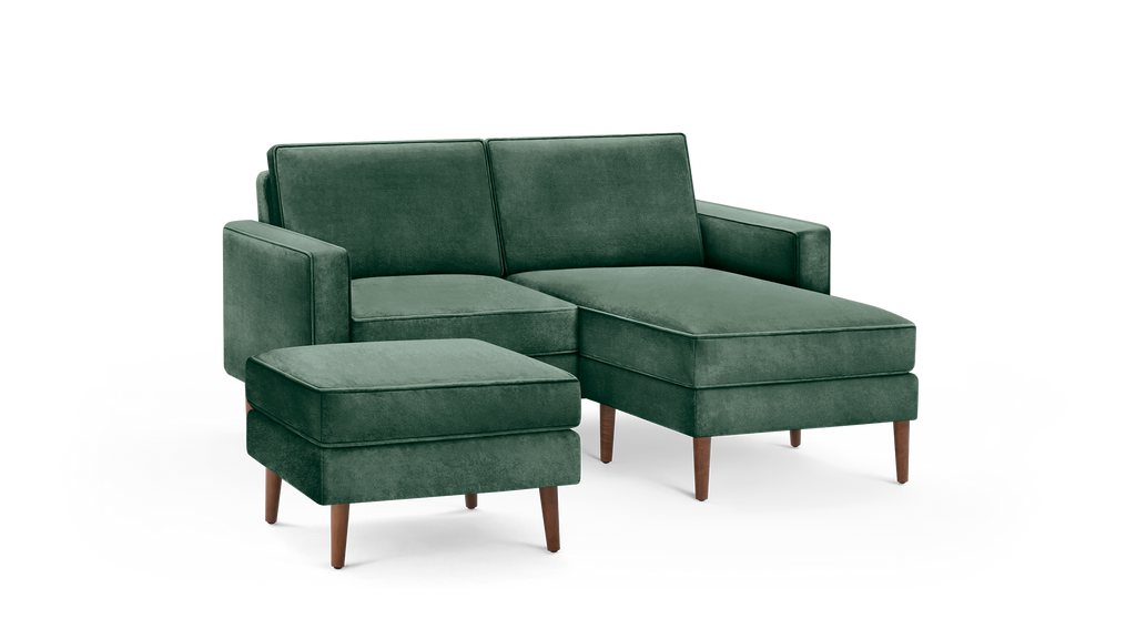 modern green velvet sectional sofa with matching ottoman and matching ottoman, featuring wooden legs and matching cushioned seats