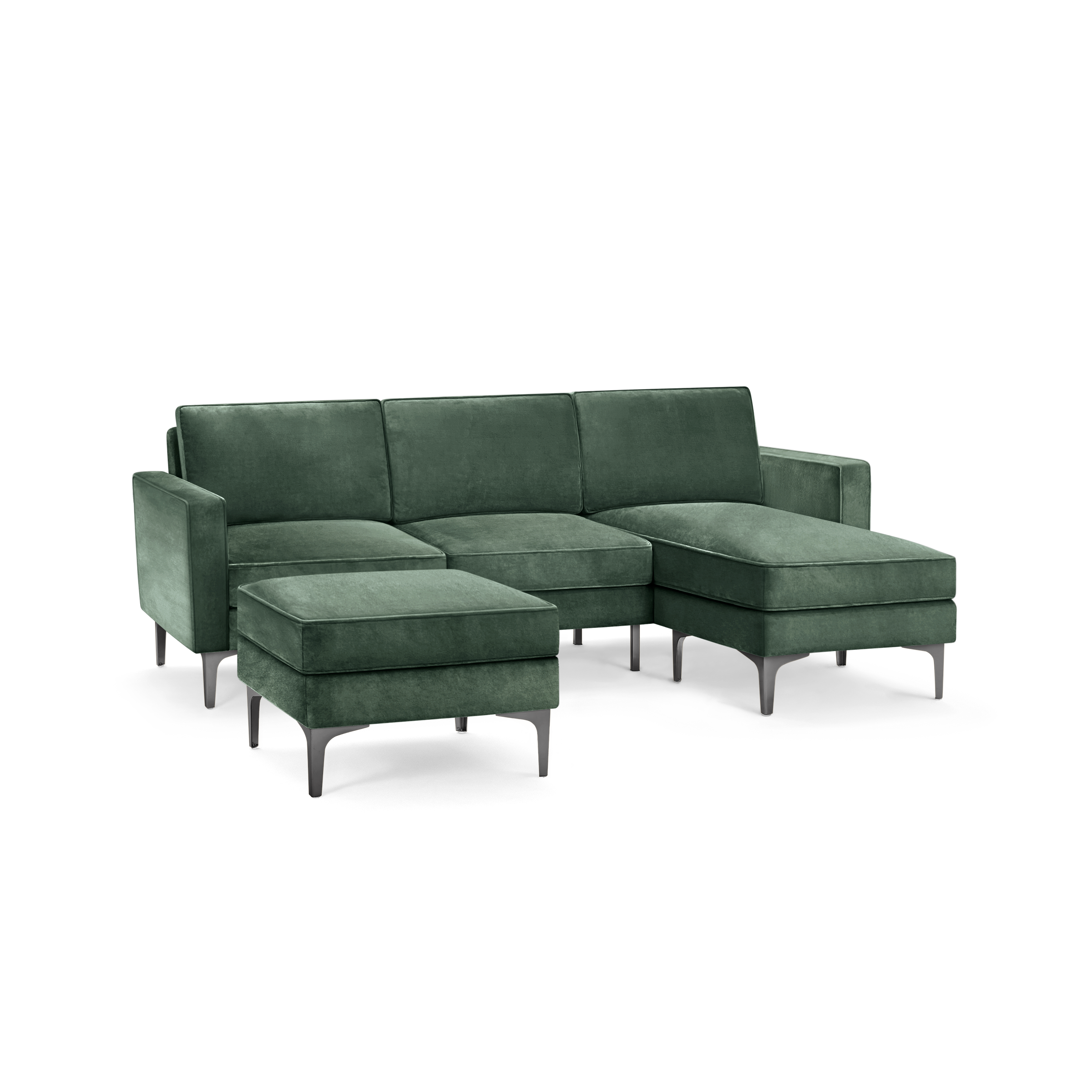 modern green velvet sectional sofa with matching ottoman, featuring sleek metal legs and sleek design on the right side