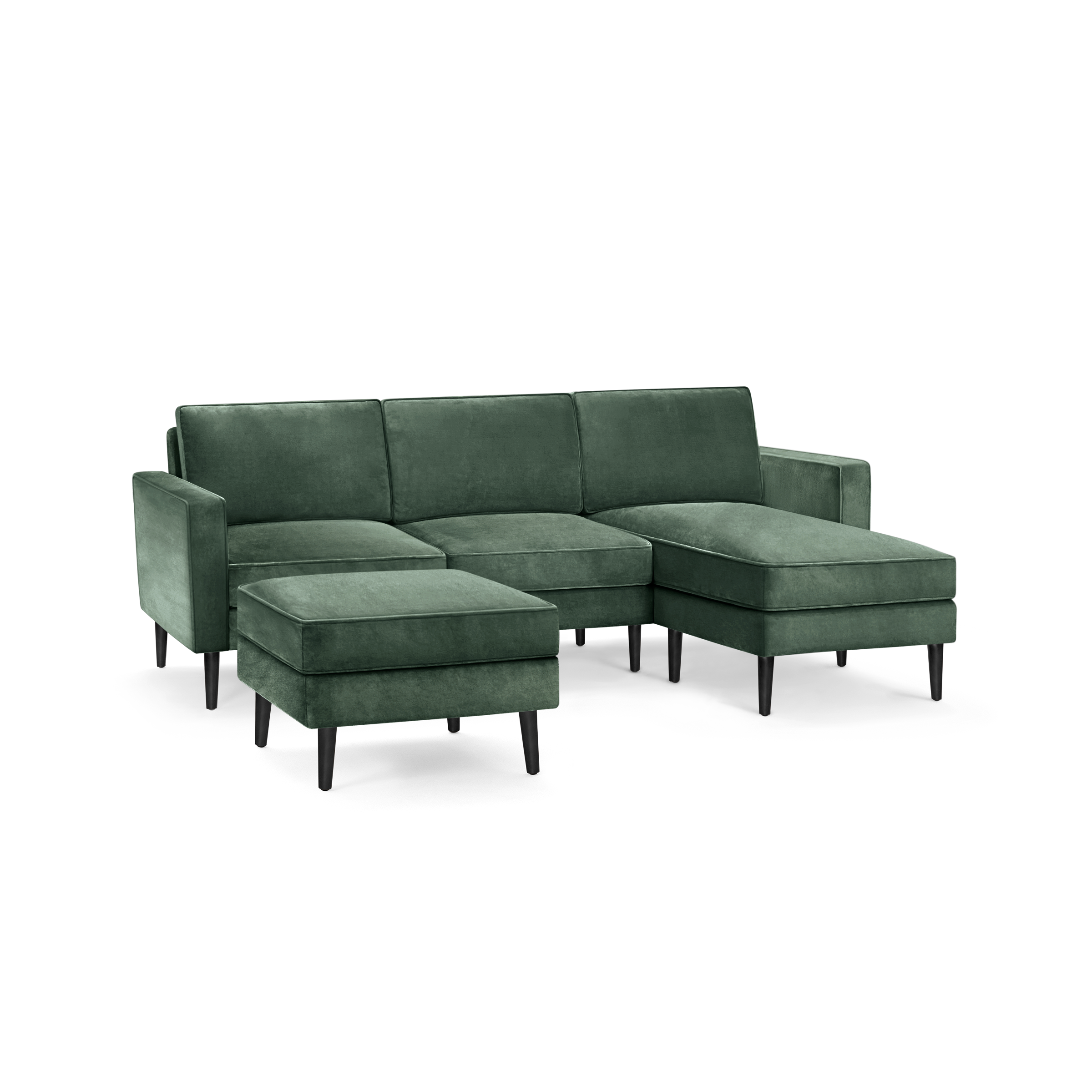 modern l - shaped sectional sofa with dark green velvet upholstery, black metal legs, and matching ottoman, designed for comfort and relaxation